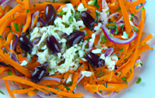 Greek Carrot Salad: Shredded carrots, chopped cucumber, crumbled feta cheese, sliced Kalamata olives, and a lemon-oregano dressing.