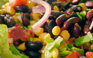 Southwest Salad: Lettuce, black beans, corn, avocado, red onion, cherry tomatoes, and a spicy dressing.