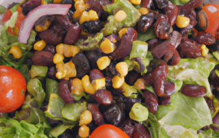 Southwest Salad: Lettuce, black beans, corn, avocado, red onion, cherry tomatoes, and a spicy dressing.
