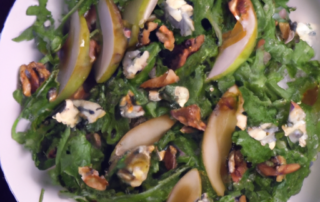 Arugula and Pear Salad with Blue Cheese and Walnuts: Toss arugula with sliced pears, crumbled blue cheese, and chopped walnuts. Drizzle with a simple vinaigrette of olive oil, balsamic vinegar, and honey.