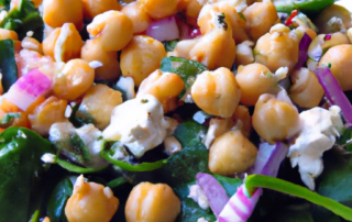 Spinach and Chickpea Salad: Spinach, canned chickpeas, chopped red onion, diced bell pepper, crumbled feta cheese, and a Greek yogurt dressing.