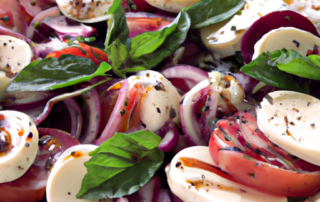 Caprese salad with red onions, fresh mozzarella, tomatoes, basil, and balsamic glaze
